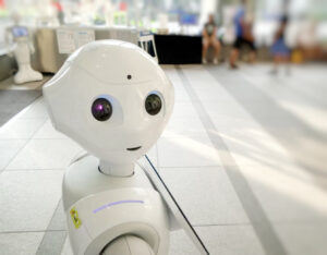 A humanoid robot represents the benefits of RPA software.